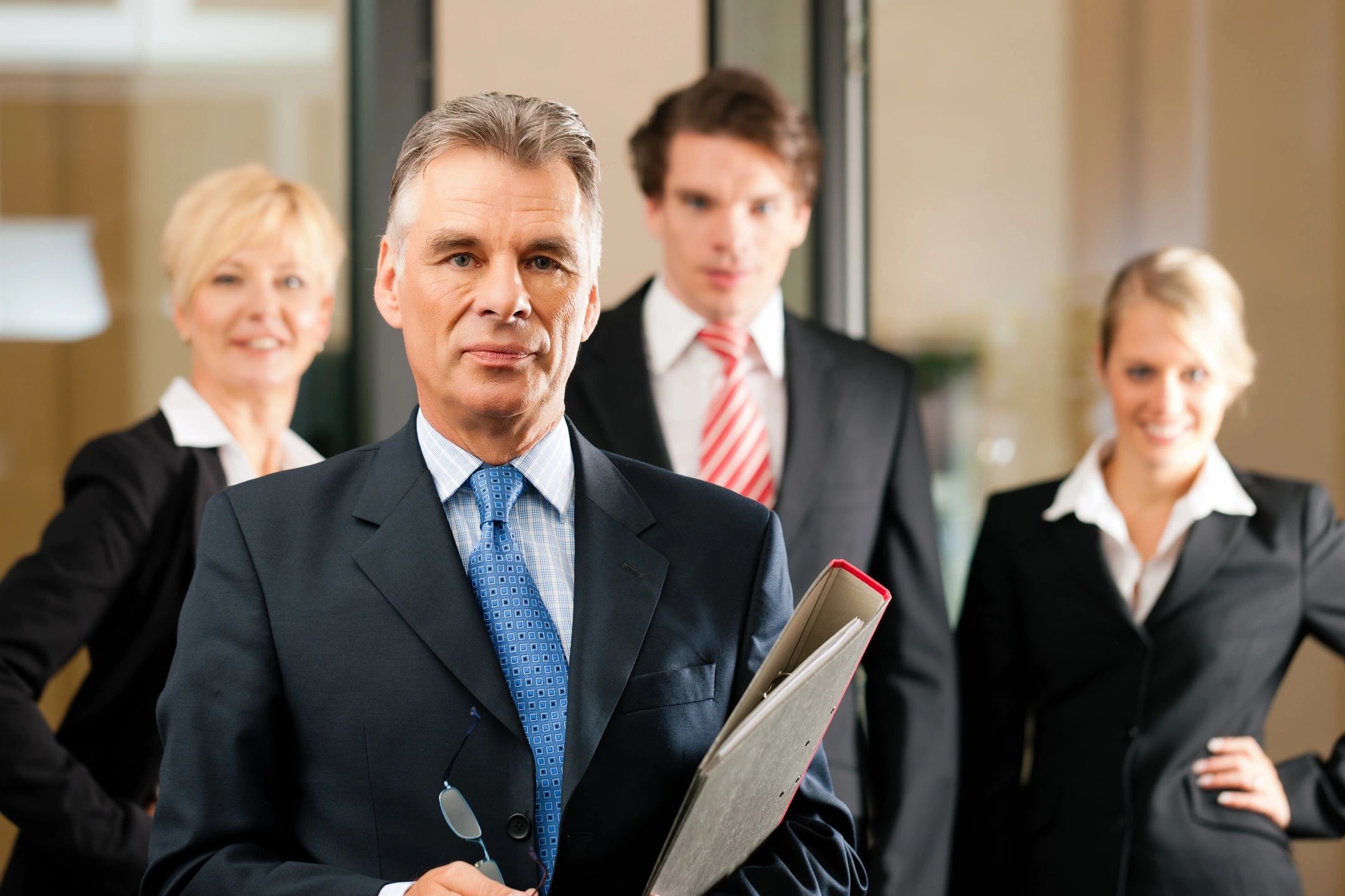 Business team standing confidently together