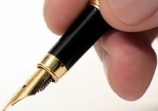 Writing tool with gold accents