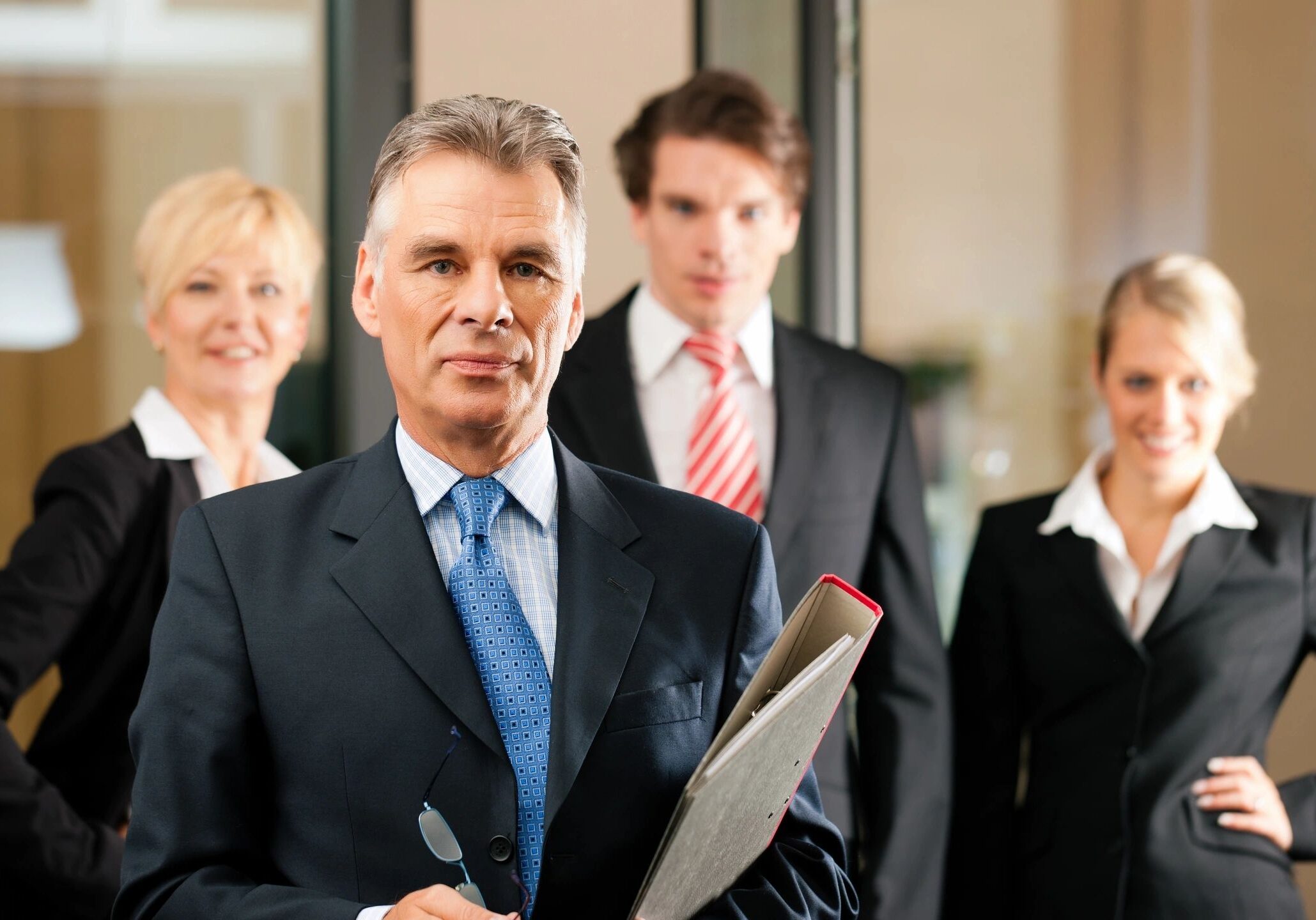 Business team standing confidently together